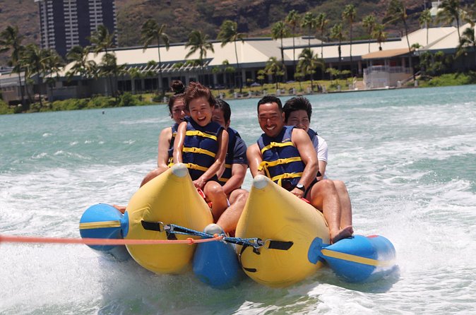 Combo Banana Boat Ride and Bumper Tube Ride in Hawaii - The bumper tube run: crossing wakes while gripping tight
