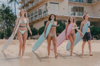 Group Surf Lesson: Two Hours Of Beginners Instruction - In the water at a secluded Waikiki spot: catching waves with help