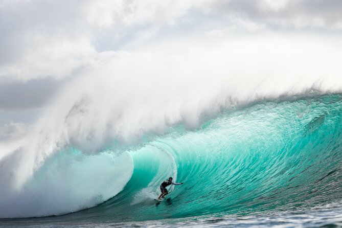 Learn to surf with a local big wave rider on the North Shore of Oahu - First Stop: Haleiwa Surf Lessons with Chance King at Kahalewai Place