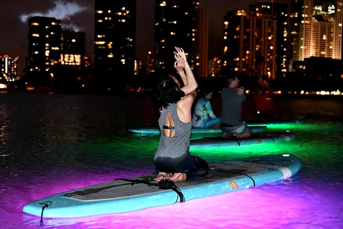 Night SUP Yoga in Honolulu, Hawaii - The Yoga Flow on the Water: Slow Poses, Big Atmosphere