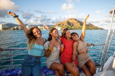 Oahu: Premium Waikiki Sunset Party Cruise with Live DJ - The boat setup: two decks, wraparound seating, and that front bow