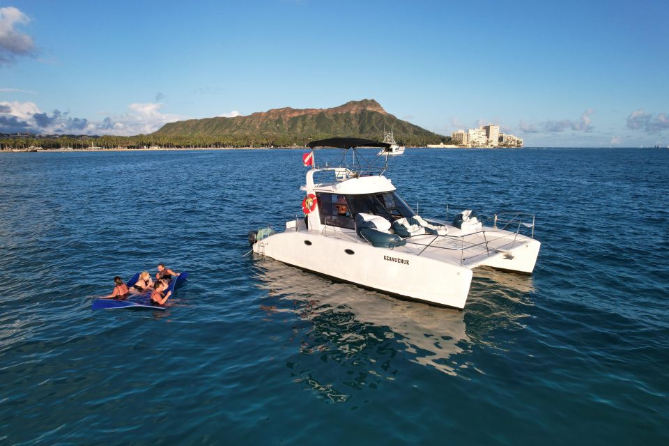 Oahu: Private Catamaran Sunset Cruise & Optional Snorkeling - Your Onboard Setup: Comfort, Coolers, Restroom, and Music