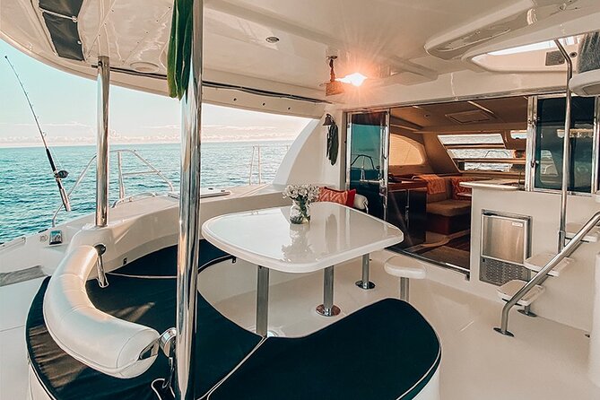 Private Oahu Sunset Charter with Tasting and Drinks - Sunset Channel Stop: Anchored Views and a Feet-in-the-Pacific Moment