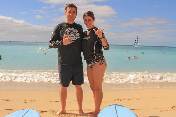 Semi-Private Surf Lesson for 2 or 3 people on Waikiki Beach - In the Water: Paddling, Catching Waves, and Standing Up
