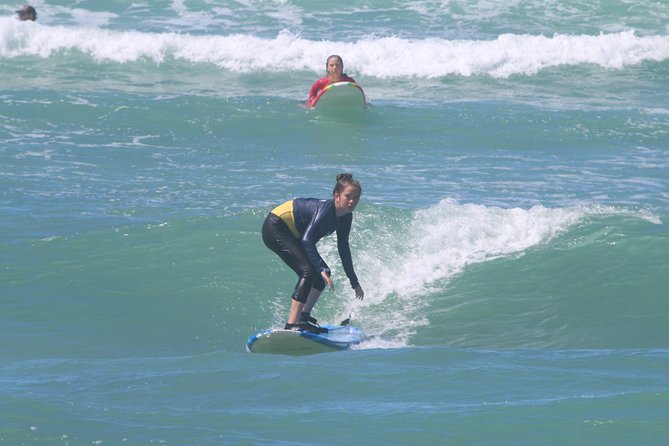 Surf HNL: Small-Group or Private Surfing Lesson (Ko'olina) - Stand-up paddleboarding option for flatter-water days