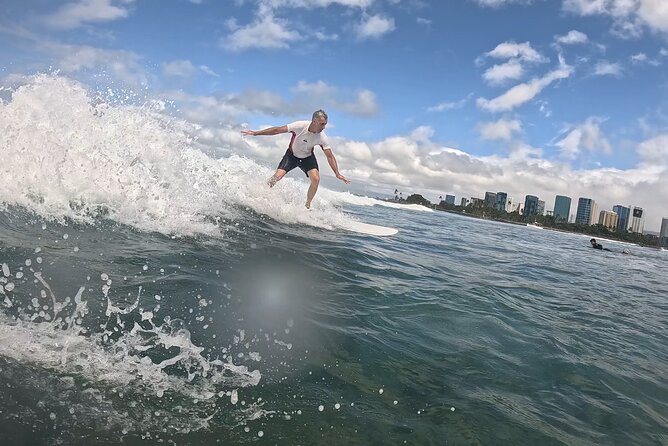 Surf Lessons get your Social Media video & photos you Surfing HI. - In the Water: How You Get Wave Time Every Few Minutes