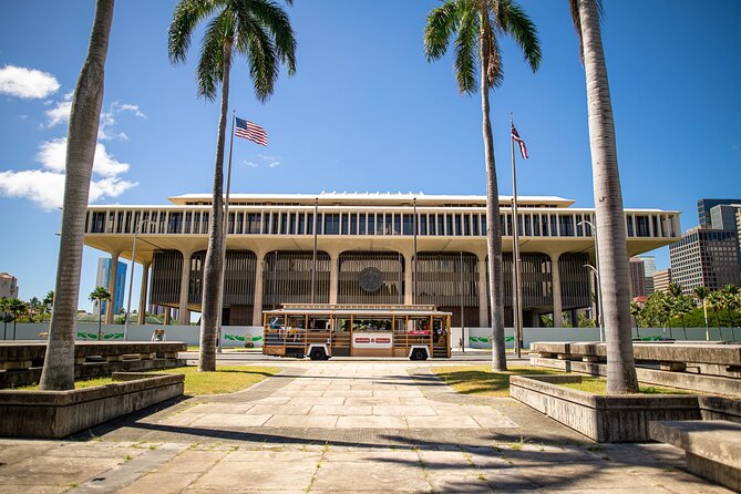 Waikiki Trolley Red Line Heroes & Legends Hop-on Hop-off Tour - Getting oriented fast: Waikiki Shopping Plaza, Duke Kahanamoku, and the Twin Fin